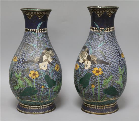 A pair of Japanese champleve enamelled baluster vases height 31cm